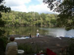 Ruth and Linda examine a little catfish way out in the river.