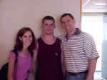 Joy and David, ready to leave on mission trip to Central America, pose with their father, George Kahl