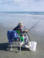 Daddy surf fishing.