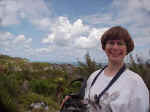 Ruth atop sand dunes carpeted with tamarisk and yucca (Spanish Bayonet)