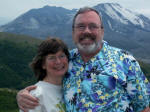 Ruth & Joe on the deck with a safe view of Mt. St. Helens.