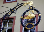 Close-up of the wonderfully crafted wrought-iron sign at the Kurpflzisches Museum der Stadt Heidelberg (Palatinate Museum of the City of Heidelberg).