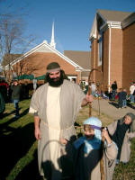 Shepherd family on the front "pastures" of Matthews United Methodist Church (and Ruth's shadow).