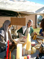 Candle-making stand and new candle molds ready to pour.